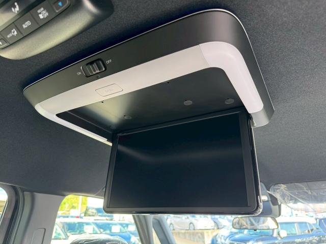 ステップワゴン ｅ：ＨＥＶスパーダ　登録済み未使用車　メーカーＯＰデカナビ　アラウンドビュー　フリップダウンモニター　電動リアゲート　シートヒーター　ハーフレザーシート　レーダークルコン　両側自動スライド　コーナーセンサー　オットマン（39枚目）