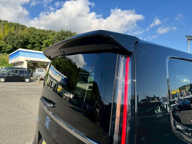 ステップワゴン ｅ：ＨＥＶスパーダ　登録済み未使用車　メーカーＯＰデカナビ　アラウンドビュー　フリップダウンモニター　電動リアゲート　シートヒーター　ハーフレザーシート　レーダークルコン　両側自動スライド　コーナーセンサー　オットマン（47枚目）