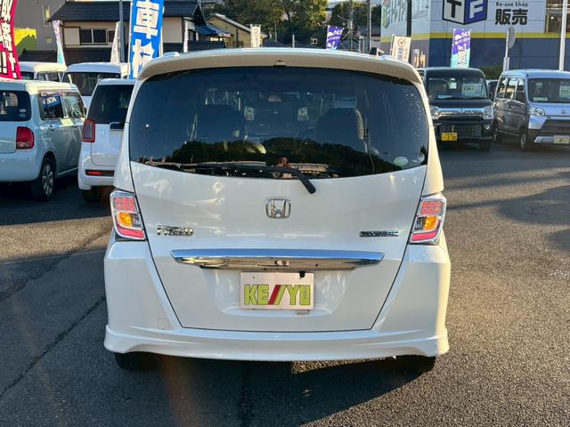 フリードハイブリッド ジャストセレクション 禁煙車 フリップダウンモニター 社外7型ナビ ドラレコ前後 ETC リア両側電動スライドドア ハーフレザーシート スマートキー オートライト 電格ミラー 革ステアリング ステリモ クルコン TRC(9枚目)