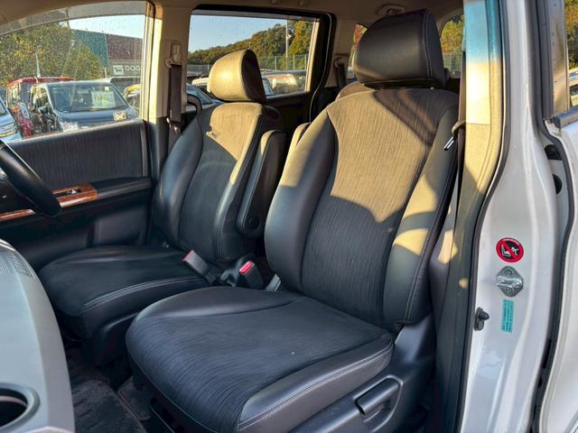 フリードハイブリッド ジャストセレクション 禁煙車 フリップダウンモニター 社外7型ナビ ドラレコ前後 ETC リア両側電動スライドドア ハーフレザーシート スマートキー オートライト 電格ミラー 革ステアリング ステリモ クルコン TRC(16枚目)