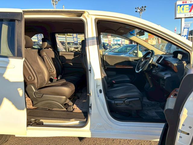 フリードハイブリッド ジャストセレクション 禁煙車 フリップダウンモニター 社外7型ナビ ドラレコ前後 ETC リア両側電動スライドドア ハーフレザーシート スマートキー オートライト 電格ミラー 革ステアリング ステリモ クルコン TRC(20枚目)