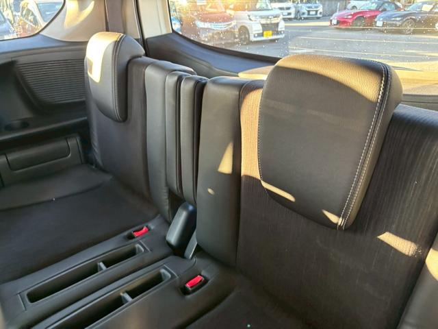 フリードハイブリッド ジャストセレクション 禁煙車 フリップダウンモニター 社外7型ナビ ドラレコ前後 ETC リア両側電動スライドドア ハーフレザーシート スマートキー オートライト 電格ミラー 革ステアリング ステリモ クルコン TRC(25枚目)