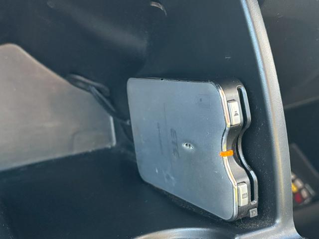 フリードハイブリッド ジャストセレクション 禁煙車 フリップダウンモニター 社外7型ナビ ドラレコ前後 ETC リア両側電動スライドドア ハーフレザーシート スマートキー オートライト 電格ミラー 革ステアリング ステリモ クルコン TRC(39枚目)