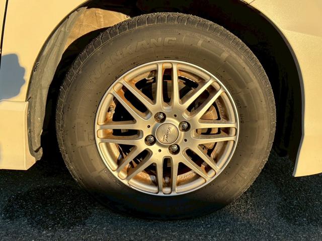 フリードハイブリッド ジャストセレクション 禁煙車 フリップダウンモニター 社外7型ナビ ドラレコ前後 ETC リア両側電動スライドドア ハーフレザーシート スマートキー オートライト 電格ミラー 革ステアリング ステリモ クルコン TRC(48枚目)