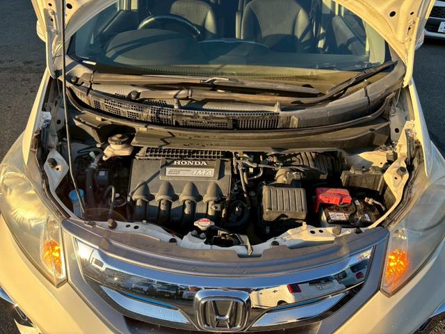 フリードハイブリッド ジャストセレクション 禁煙車 フリップダウンモニター 社外7型ナビ ドラレコ前後 ETC リア両側電動スライドドア ハーフレザーシート スマートキー オートライト 電格ミラー 革ステアリング ステリモ クルコン TRC(51枚目)