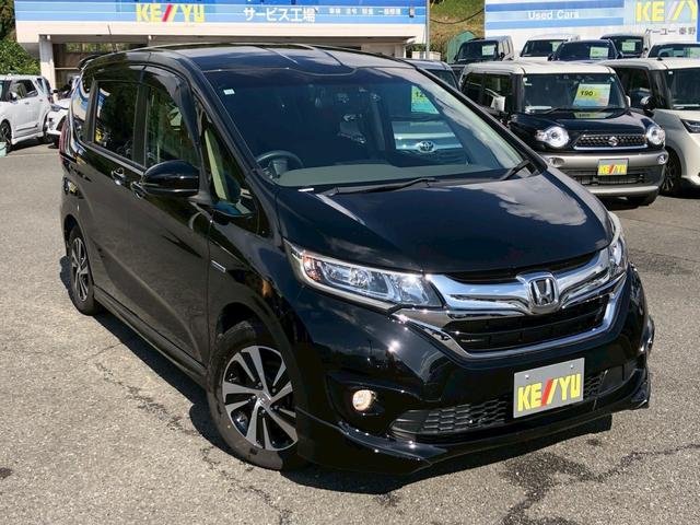 フリードハイブリッド ハイブリッド・Ｇホンダセンシング　Ｓパッケージ　モデューロエアロ　禁煙車　純正９型ナビ　ブルートゥース　バックカメラ　ドラレコ前後　ＥＴＣ　レーダークルコン　後席サンシェード　リア両側電動スライドドア　スマートキー　レーンキープ　ＰＷ（7枚目）