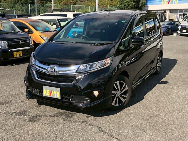 フリードハイブリッド ハイブリッド・Ｇホンダセンシング　Ｓパッケージ　モデューロエアロ　禁煙車　純正９型ナビ　ブルートゥース　バックカメラ　ドラレコ前後　ＥＴＣ　レーダークルコン　後席サンシェード　リア両側電動スライドドア　スマートキー　レーンキープ　ＰＷ（12枚目）