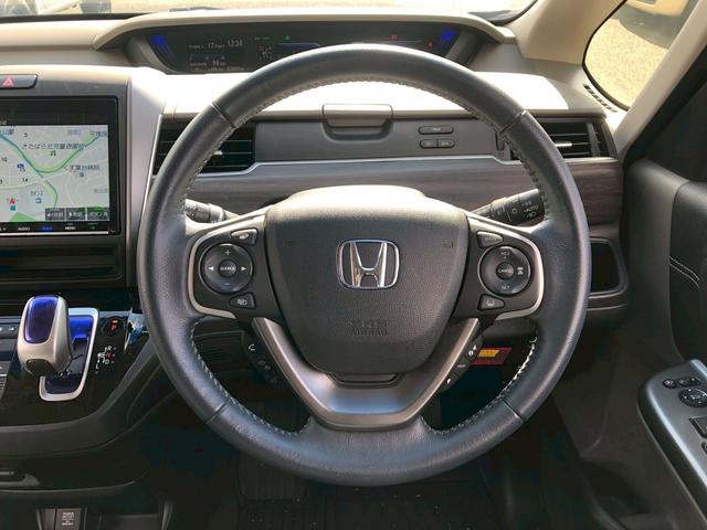 フリードハイブリッド ハイブリッド・Ｇホンダセンシング　Ｓパッケージ　モデューロエアロ　禁煙車　純正９型ナビ　ブルートゥース　バックカメラ　ドラレコ前後　ＥＴＣ　レーダークルコン　後席サンシェード　リア両側電動スライドドア　スマートキー　レーンキープ　ＰＷ（13枚目）