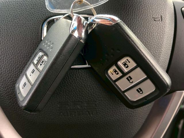 フリードハイブリッド ハイブリッド・Ｇホンダセンシング　Ｓパッケージ　モデューロエアロ　禁煙車　純正９型ナビ　ブルートゥース　バックカメラ　ドラレコ前後　ＥＴＣ　レーダークルコン　後席サンシェード　リア両側電動スライドドア　スマートキー　レーンキープ　ＰＷ（58枚目）