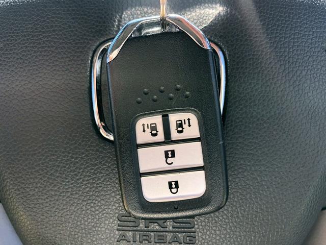 ステップワゴンスパーダ スパーダ ホンダセンシング 禁煙 1オーナー 純正10型ナビ ターボ フリップダウンモニター ブルートゥース DVD バックカメラ フルセグTV レーダークルーズ パドルシフト レーンキープアシスト ビルトインETC LEDオートライト フォグ ウインカーミラー(64枚目)