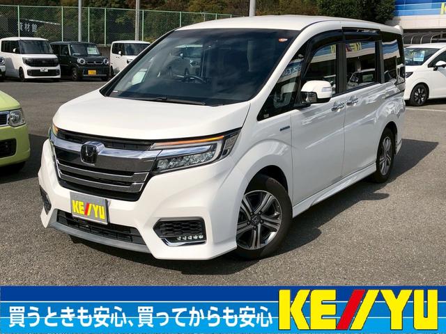 ステップワゴンスパーダ スパーダハイブリッド　Ｇ　ホンダセンシング　衝突軽減ブレーキ　禁煙車　フリップダウンモニター　純正８型ナビ　ＤＶＤ　ブルートゥース　ＴＶ　バックカメラ　ＥＴＣ　両側電動スライドドア　ＬＥＤオートライト　レーダークルーズコントロール　後席サンシェード　車線逸脱警告（3枚目）