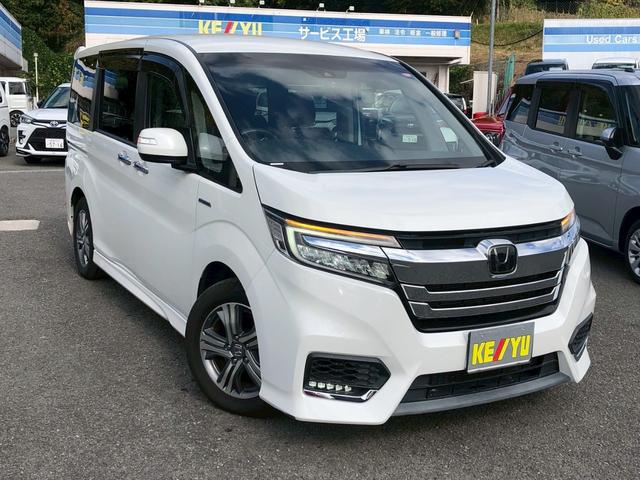 ステップワゴンスパーダ スパーダハイブリッド　Ｇ　ホンダセンシング　衝突軽減ブレーキ　禁煙車　フリップダウンモニター　純正８型ナビ　ＤＶＤ　ブルートゥース　ＴＶ　バックカメラ　ＥＴＣ　両側電動スライドドア　ＬＥＤオートライト　レーダークルーズコントロール　後席サンシェード　車線逸脱警告（7枚目）