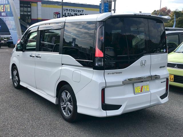ステップワゴンスパーダ スパーダハイブリッド　Ｇ　ホンダセンシング　衝突軽減ブレーキ　禁煙車　フリップダウンモニター　純正８型ナビ　ＤＶＤ　ブルートゥース　ＴＶ　バックカメラ　ＥＴＣ　両側電動スライドドア　ＬＥＤオートライト　レーダークルーズコントロール　後席サンシェード　車線逸脱警告（10枚目）