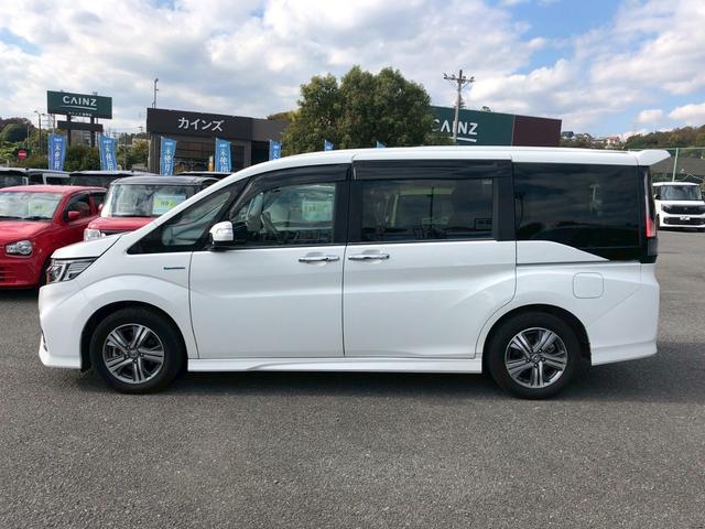 ステップワゴンスパーダ スパーダハイブリッド　Ｇ　ホンダセンシング　衝突軽減ブレーキ　禁煙車　フリップダウンモニター　純正８型ナビ　ＤＶＤ　ブルートゥース　ＴＶ　バックカメラ　ＥＴＣ　両側電動スライドドア　ＬＥＤオートライト　レーダークルーズコントロール　後席サンシェード　車線逸脱警告（11枚目）