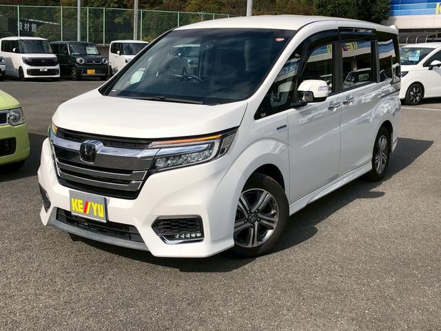 ステップワゴンスパーダ スパーダハイブリッド　Ｇ　ホンダセンシング　衝突軽減ブレーキ　禁煙車　フリップダウンモニター　純正８型ナビ　ＤＶＤ　ブルートゥース　ＴＶ　バックカメラ　ＥＴＣ　両側電動スライドドア　ＬＥＤオートライト　レーダークルーズコントロール　後席サンシェード　車線逸脱警告（12枚目）