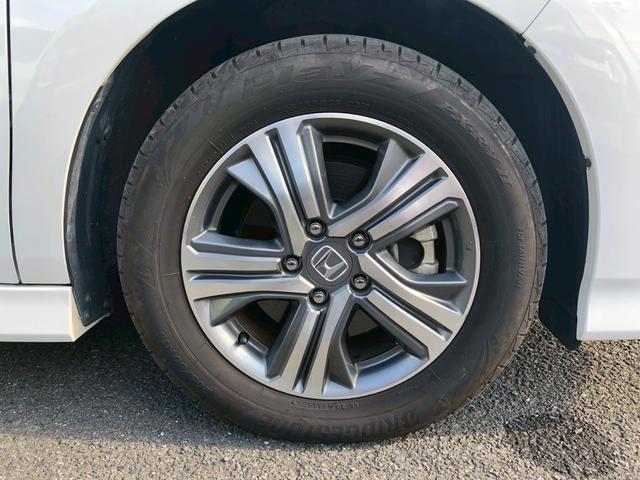 ステップワゴンスパーダ スパーダハイブリッド　Ｇ　ホンダセンシング　衝突軽減ブレーキ　禁煙車　フリップダウンモニター　純正８型ナビ　ＤＶＤ　ブルートゥース　ＴＶ　バックカメラ　ＥＴＣ　両側電動スライドドア　ＬＥＤオートライト　レーダークルーズコントロール　後席サンシェード　車線逸脱警告（62枚目）