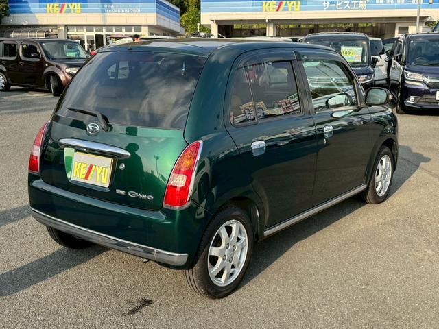 ミラジーノ プレミアムX 禁煙 革調シートカバー 7型ナビ バックカメラ ブルートゥース DVD CD MOMOウッドハンドル ETC HID フォグランプ ウインカー付き電格ミラー オートライト キーレス ヘットライトレベライザー Wエアバック ウインカー付き電格ミラー(7枚目)