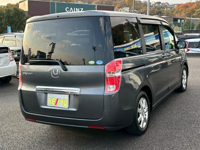 ステップワゴン Ｇ　Ｌパッケージ　禁煙　純正７型ナビ　バックカメラ　両側自動スライド　ビルトインＥＴＣ　オートライト　オートエアコン　電格ミラーウィンカー　サイドバイザー　ダブルエアバック　純正アルミ　オートライト　ＡＢＳ（4枚目）