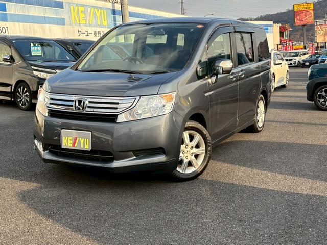 ステップワゴン Ｇ　Ｌパッケージ　禁煙　純正７型ナビ　バックカメラ　両側自動スライド　ビルトインＥＴＣ　オートライト　オートエアコン　電格ミラーウィンカー　サイドバイザー　ダブルエアバック　純正アルミ　オートライト　ＡＢＳ（12枚目）