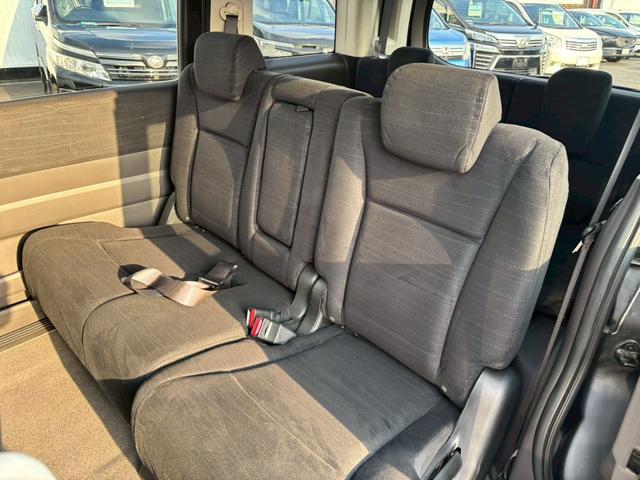 ステップワゴン Ｇ　Ｌパッケージ　禁煙　純正７型ナビ　バックカメラ　両側自動スライド　ビルトインＥＴＣ　オートライト　オートエアコン　電格ミラーウィンカー　サイドバイザー　ダブルエアバック　純正アルミ　オートライト　ＡＢＳ（22枚目）