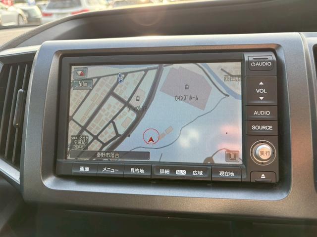 ステップワゴン Ｇ　Ｌパッケージ　禁煙　純正７型ナビ　バックカメラ　両側自動スライド　ビルトインＥＴＣ　オートライト　オートエアコン　電格ミラーウィンカー　サイドバイザー　ダブルエアバック　純正アルミ　オートライト　ＡＢＳ（28枚目）