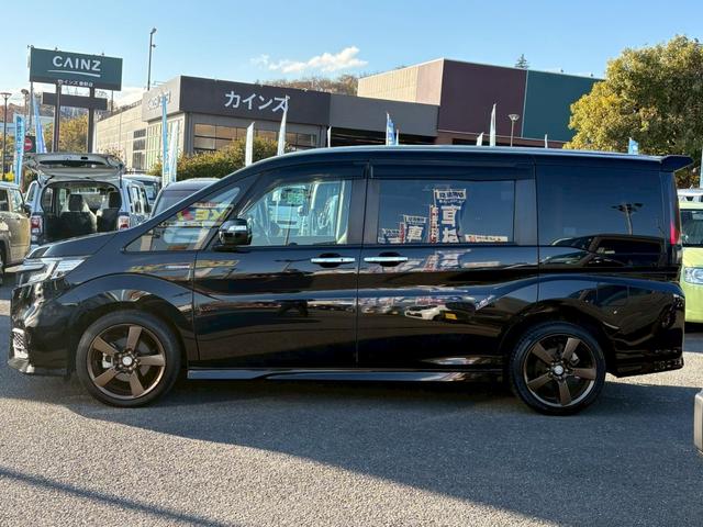 ステップワゴンスパーダ スパーダハイブリッド G・EXホンダセンシング 後席モニター 禁煙 9型ナビ バックカメラ ハーフレザーシート クルーズコントロール ETC シートヒーター わくわくゲート コーナーセンサー LED 両側自動スライド 衝突軽減ブレーキ 【マツダゴールドアルミ】(11枚目)