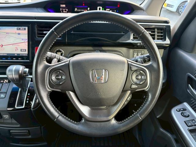 ステップワゴンスパーダ スパーダ・クールスピリット　禁煙車　純正９型ナビ　ＨＤＭＩ　フリップダウンモニター　フルセグＴＶ　ＤＶＤ　ＣＤ　ブルートゥース　バックカメラ　衝突軽減ブレーキ　レーンキープアシスト　レーダークルーズ　パドルシフト　前後ドラレコ　ＬＥＤライト　わくわくゲート（12枚目）