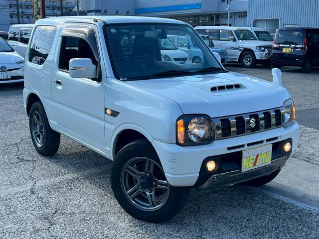 ジムニー ランドベンチャー【4WD◆特別仕様車】弊社直販◆7型ナビ ◆ターボ◆禁煙【Bluetooth対応/フルセグTV/CD/DVD】ETC車載器◆ハーフレザー◆HIDライト/フォグ◆ケンウッド製前後方ドライブレコーダー◆背面タイヤ◆キーレス◆2023年製造タイヤ(12枚目)