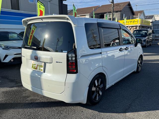 フリード ｅ：ＨＥＶエアー　ＥＸ　９インチナビ　エアロバンパー　フルセグ　Ｂｌｕｅｔｏｏｔｈ　ＥＴＣ　ワンオーナー　両側電動スライド　リヤスポイラー　ハーフレザー　シートヒーター　禁煙　ローダウン　ＢＳＭ　レーダークルーズ（6枚目）