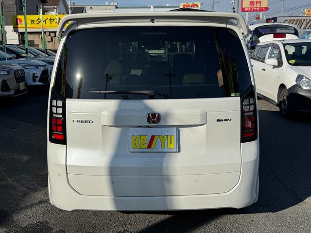 フリード ｅ：ＨＥＶエアー　ＥＸ　９インチナビ　エアロバンパー　フルセグ　Ｂｌｕｅｔｏｏｔｈ　ＥＴＣ　ワンオーナー　両側電動スライド　リヤスポイラー　ハーフレザー　シートヒーター　禁煙　ローダウン　ＢＳＭ　レーダークルーズ（7枚目）