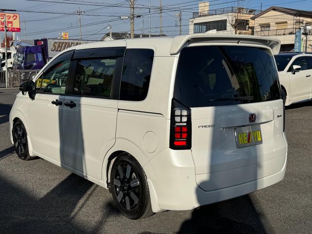 フリード ｅ：ＨＥＶエアー　ＥＸ　９インチナビ　エアロバンパー　フルセグ　Ｂｌｕｅｔｏｏｔｈ　ＥＴＣ　ワンオーナー　両側電動スライド　リヤスポイラー　ハーフレザー　シートヒーター　禁煙　ローダウン　ＢＳＭ　レーダークルーズ（8枚目）