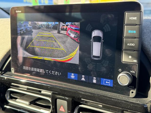 フリード ｅ：ＨＥＶエアー　ＥＸ　９インチナビ　エアロバンパー　フルセグ　Ｂｌｕｅｔｏｏｔｈ　ＥＴＣ　ワンオーナー　両側電動スライド　リヤスポイラー　ハーフレザー　シートヒーター　禁煙　ローダウン　ＢＳＭ　レーダークルーズ（14枚目）