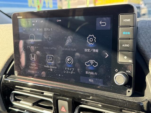 フリード ｅ：ＨＥＶエアー　ＥＸ　９インチナビ　エアロバンパー　フルセグ　Ｂｌｕｅｔｏｏｔｈ　ＥＴＣ　ワンオーナー　両側電動スライド　リヤスポイラー　ハーフレザー　シートヒーター　禁煙　ローダウン　ＢＳＭ　レーダークルーズ（15枚目）