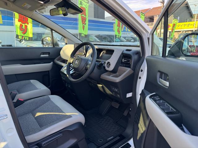 フリード ｅ：ＨＥＶエアー　ＥＸ　９インチナビ　エアロバンパー　フルセグ　Ｂｌｕｅｔｏｏｔｈ　ＥＴＣ　ワンオーナー　両側電動スライド　リヤスポイラー　ハーフレザー　シートヒーター　禁煙　ローダウン　ＢＳＭ　レーダークルーズ（27枚目）