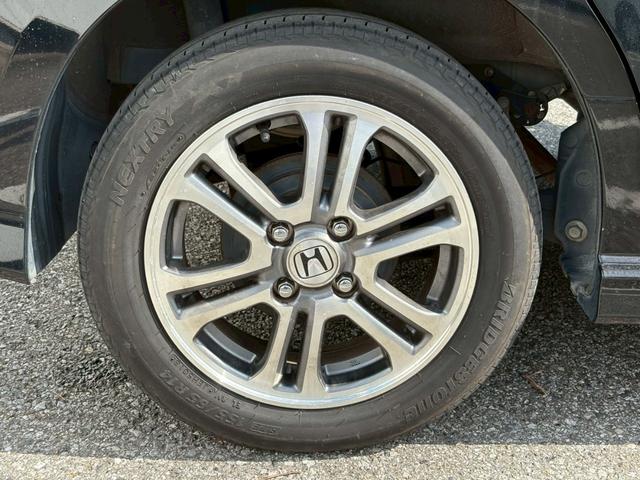 N-BOXカスタム G・Lパッケージ 禁煙 フル装備 スマートキー プッシュスタート 社外7インチナビ フルセグ CD DVD ミュージックサーバー USB Bluetooth バックカメラ 左パワースライドドア フリップダウンモニター(25枚目)