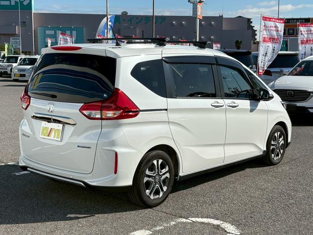 フリードハイブリッド ハイブリッド・クロスター　禁煙　ワンオーナー　ベースキャリア　衝突被害軽減システム　レーンアシスト　クルーズコントロール　横滑り防止　社外ナビ　フルセグ　ＣＤ　ＤＶＤ　ＵＳＢ　Ｂｌｕｅｔｏｏｔｈ　バックカメラ　ドラレコ前後（10枚目）