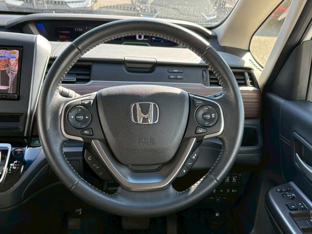 フリードハイブリッド ハイブリッド・クロスター　禁煙　ワンオーナー　ベースキャリア　衝突被害軽減システム　レーンアシスト　クルーズコントロール　横滑り防止　社外ナビ　フルセグ　ＣＤ　ＤＶＤ　ＵＳＢ　Ｂｌｕｅｔｏｏｔｈ　バックカメラ　ドラレコ前後（27枚目）