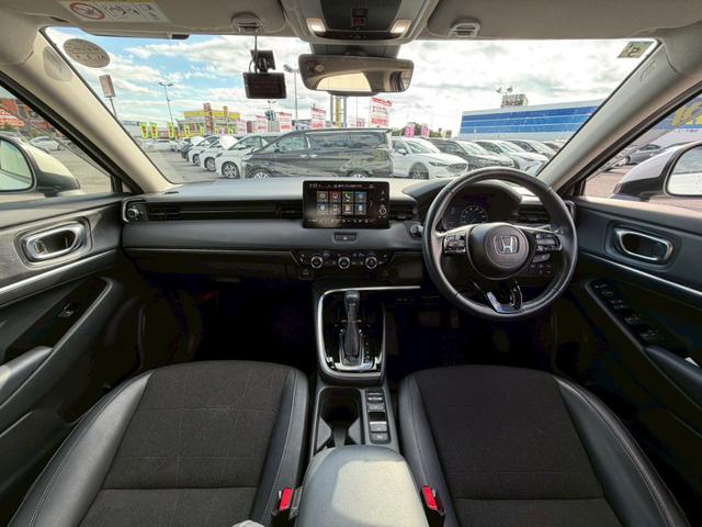 ヴェゼル ｅ：ＨＥＶ　Ｚ　禁煙／　１オーナー／後退出庫サポート／前後ドラレコ／衝突被害軽減システム／コーナーセンサー／純正９型ナビ／フルセグ／Ｂｌｕｅｔｏｏｔｈ／バックカメラ／ヒーター付ハーフレザーシート／置くだけ充電／ＥＴＣ２．０（12枚目）