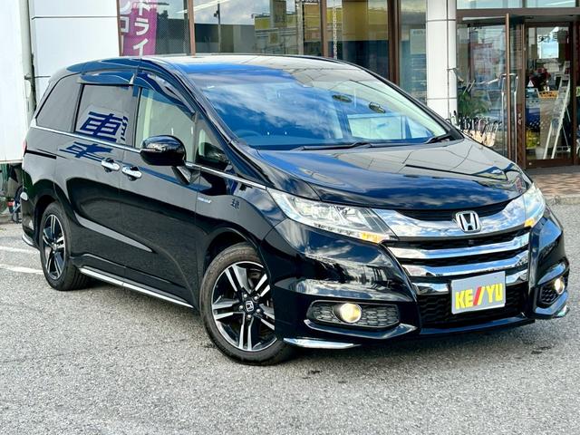 オデッセイハイブリッド ハイブリッドアブソルート・ホンダセンシンアドバンスＰ　禁煙／衝突被害軽減システム／メーカーオプションナビ／フルセグ／ＨＤＭＩ入力／ＣＤ／ＤＶＤ／Ｂｌｕｅｔｏｏｔｈ／全方位カメラ／両側電動スライド／ハーフレザーシート／ＬＥＤライト／純正アルミ／ＥＴＣ（6枚目）