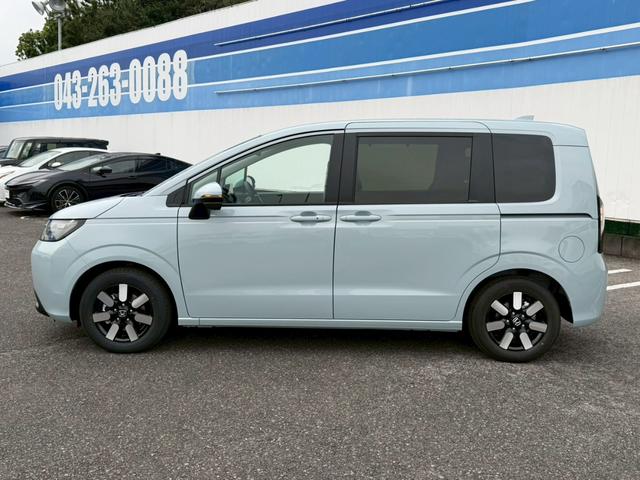 フリード e:HEVエアー EX☆登録済未使用車☆純正11.4型ナビ/ 全方位カメラ/衝突被害軽減システム/コーナーセンサー/ブラインドスポットモニター/追従型クルコン/ヒーター付ハーフレザーシート/LEDオートライト/純正アルミ/ETC2.0/リアクーラー/保証書(8枚目)