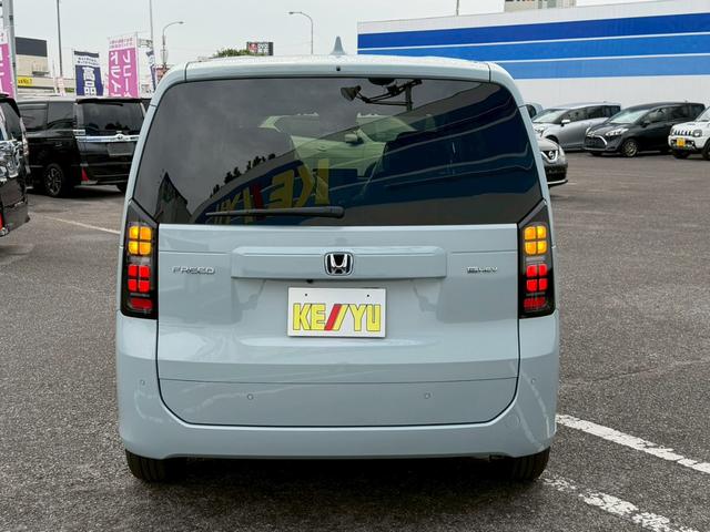 フリード e:HEVエアー EX☆登録済未使用車☆純正11.4型ナビ/ 全方位カメラ/衝突被害軽減システム/コーナーセンサー/ブラインドスポットモニター/追従型クルコン/ヒーター付ハーフレザーシート/LEDオートライト/純正アルミ/ETC2.0/リアクーラー/保証書(10枚目)