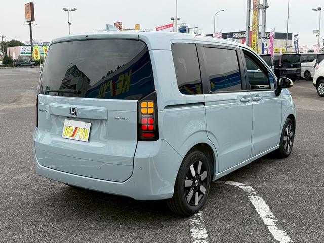 フリード e:HEVエアー EX☆登録済未使用車☆純正11.4型ナビ/ 全方位カメラ/衝突被害軽減システム/コーナーセンサー/ブラインドスポットモニター/追従型クルコン/ヒーター付ハーフレザーシート/LEDオートライト/純正アルミ/ETC2.0/リアクーラー/保証書(11枚目)