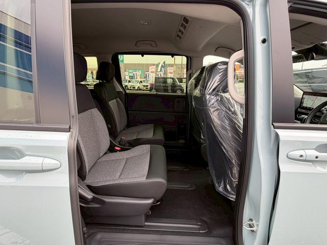 フリード e:HEVエアー EX☆登録済未使用車☆純正11.4型ナビ/ 全方位カメラ/衝突被害軽減システム/コーナーセンサー/ブラインドスポットモニター/追従型クルコン/ヒーター付ハーフレザーシート/LEDオートライト/純正アルミ/ETC2.0/リアクーラー/保証書(33枚目)