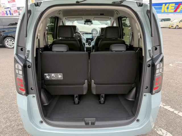 フリード e:HEVエアー EX☆登録済未使用車☆純正11.4型ナビ/ 全方位カメラ/衝突被害軽減システム/コーナーセンサー/ブラインドスポットモニター/追従型クルコン/ヒーター付ハーフレザーシート/LEDオートライト/純正アルミ/ETC2.0/リアクーラー/保証書(40枚目)