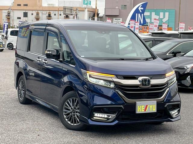ステップワゴン ハイブリッドモデューロＸ　ホンダセンシング　純正１０インチナビ＆フリップダウンモニター／マルチビューカメラシステム／ハーフレザーシート／デジタルインナーミラー／両側パワースライドドア／純正ドラレコ／衝突被害軽減システム／シートヒーター／禁煙（7枚目）