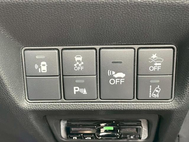 ステップワゴン ハイブリッドモデューロＸ　ホンダセンシング　純正１０インチナビ＆フリップダウンモニター／マルチビューカメラシステム／ハーフレザーシート／デジタルインナーミラー／両側パワースライドドア／純正ドラレコ／衝突被害軽減システム／シートヒーター／禁煙（12枚目）