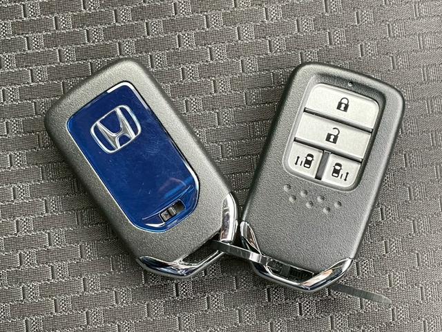 ステップワゴン ハイブリッドモデューロＸ　ホンダセンシング　純正１０インチナビ＆フリップダウンモニター／マルチビューカメラシステム／ハーフレザーシート／デジタルインナーミラー／両側パワースライドドア／純正ドラレコ／衝突被害軽減システム／シートヒーター／禁煙（47枚目）