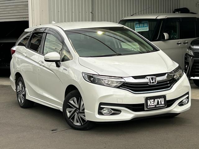 シャトル ハイブリッド ◆【禁煙・社外7型メモリーナビ】 133,739KM/R7年製タイヤ/フルセグ/CD/DVD/ラジオ/HIDライト/スチールホイール/ETC/スマートキー/ヘッドライトレベライザー/横滑り防止/オートエアコン保証書/取扱説明書(9枚目)