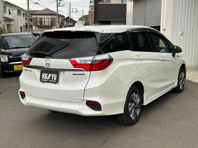 シャトル ハイブリッド ◆【禁煙・社外7型メモリーナビ】 133,739KM/R7年製タイヤ/フルセグ/CD/DVD/ラジオ/HIDライト/スチールホイール/ETC/スマートキー/ヘッドライトレベライザー/横滑り防止/オートエアコン保証書/取扱説明書(10枚目)