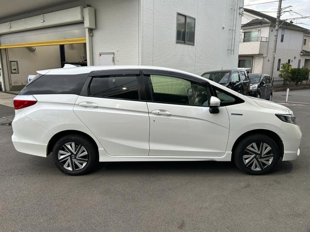 シャトル ハイブリッド ◆【禁煙・社外7型メモリーナビ】 133,739KM/R7年製タイヤ/フルセグ/CD/DVD/ラジオ/HIDライト/スチールホイール/ETC/スマートキー/ヘッドライトレベライザー/横滑り防止/オートエアコン保証書/取扱説明書(13枚目)